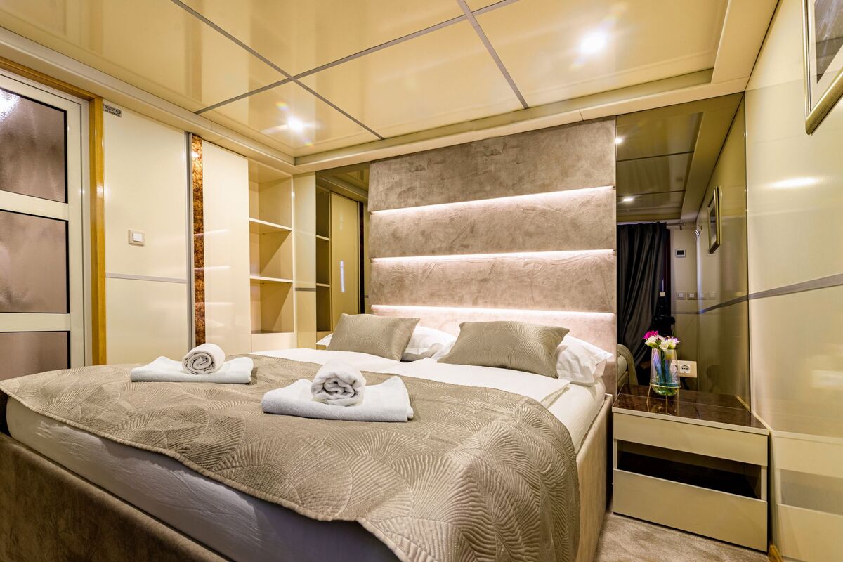 Stateroom with king-size bed on MS Melody